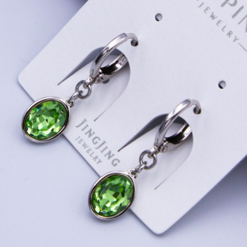 Сережки Xuping№751 9х5мм SWAROVSKI салатового кольору на круглому замку оптом купити сережки xuping родii від виробника